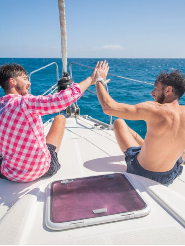 gay couple sailing charter