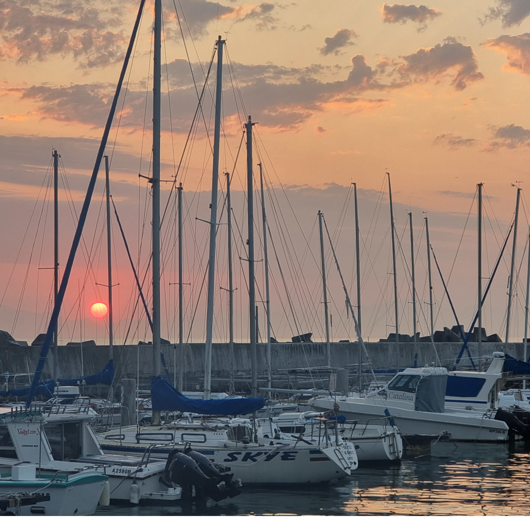 sunset over Gordons Bay harbour